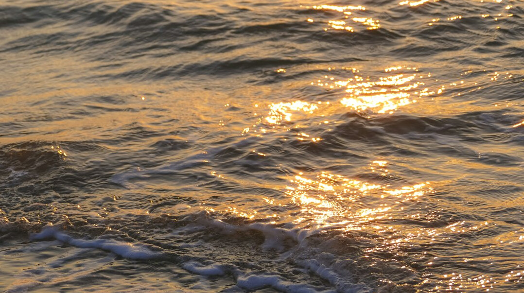 ocean waves at sunset